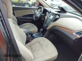 2016 Hyundai Santa Fe z VIN 5XYZU3LB2GG316241, wystawiony jako IAAI lot #42636996 z przebiegiem 256 253 mil mil oraz . Historia ofert i sprzedaży dostępna na DreamBid. Obrazek 5.