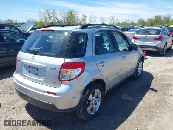 2012 Suzuki SX4 Crossover with VIN JS2YB5A36C6300510, listed as a IAAI auction lot 42140760 with 110,498 mi miles and . Bid and sale history available at carsss.com. Image 4.
