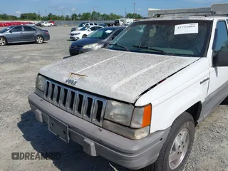 1994 Jeep Grand Cherokee Laredo with VIN 1J4GZ58S6RC295621, listed as a IAAI auction lot 42751869 with 370,230 mi miles and . Bid and sale history available at DreamBid. Image 6.