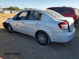 2013 Suzuki SX4 LE with VIN JS2YC5A30D6101502, listed as a Copart auction lot 77066564 with 96,626 mi miles and Salvage Title. Bid and sale history available at carsss.com. Image 2.