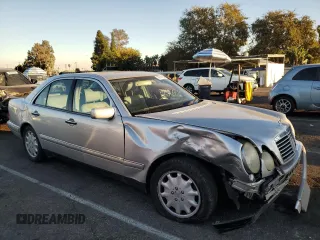 1999 Mercedes-Benz E-Class with VIN WDBJF65H8XA734585, listed as a Copart auction lot 79141194 with 196,908 mi miles and Salvage Title. Bid and sale history available at carsss.com. Image 4.