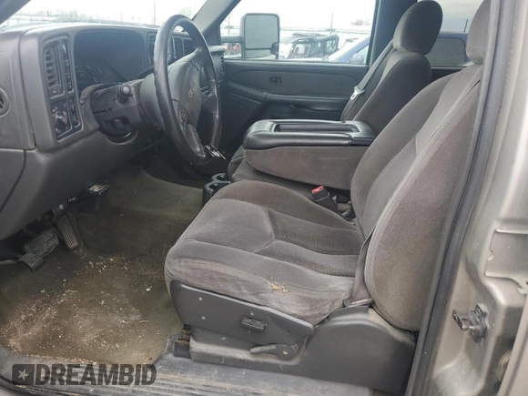2003 GMC Sierra 2500HD SLT z VIN 1GTHK23183F142482, wystawiony jako Copart lot #51675765 z przebiegiem 198 316 mil mil oraz Szkoda całkowita • Salvage title. Historia ofert i sprzedaży dostępna na DreamBid. Obrazek 7.