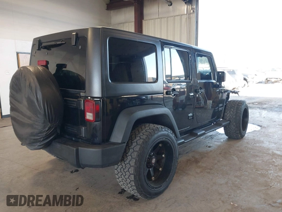 2012 Jeep Wrangler Unlimited Sport with VIN 1C4BJWDG8CL246829, listed as a IAAI auction lot 41816197 with 198,502 mi miles. Bid and sale history available at carsss.com. Image 4.