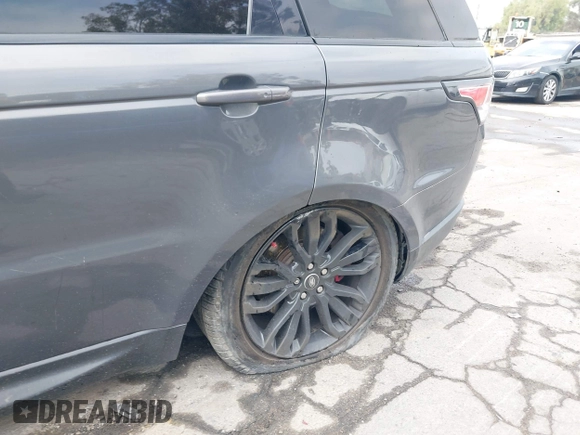 2017 Land Rover Range Rover Sport z VIN SALWR2FE3HA128925, wystawiony jako IAAI lot #42172945 z przebiegiem 82 022 mil mil oraz . Historia ofert i sprzedaży dostępna na DreamBid. Obrazek 18.