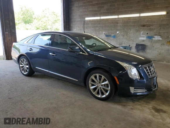 2013 Cadillac XTS Luxury with VIN 2G61P5S31D9140707, listed as a Copart auction lot 59008905 with 93,427 mi miles and Salvage title. Bid and sale history available at DreamBid. Image 4.