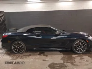 2023 BMW 8 Series with VIN WBAFY4C01PCM52812, listed as a IAAI auction lot 41967777 with 12,490 mi miles and . Bid and sale history available at DreamBid. Image 13.