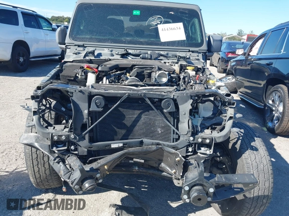 2021 Jeep Gladiator Willys with VIN 1C6HJTAG4ML517715, listed as a IAAI auction lot 41436634 with 21,187 mi miles and . Bid and sale history available at DreamBid. Image 6.