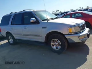 1997 Ford Expedition XLT with VIN 1FMEU17L4VLA03727, listed as a IAAI auction lot 42807480 with 222,138 mi miles and . Bid and sale history available at DreamBid. Image 1.
