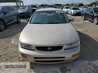 1995 Nissan Maxima GLE с VIN JN1CA21D1ST067119, выставлен на аукционе Copart как лот 53255025 с пробегом 74 851 миль миль и На запчасти • Non repairable. История ставок и продаж доступна на DreamBid. Изображение 5.