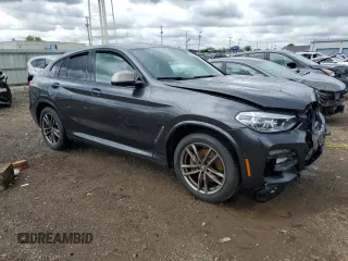 2021 BMW X4 M40i z VIN 5UX2V5C0XM9F04867, wystawiony jako Copart lot #57890555 z przebiegiem 40 563 mil mil oraz Szkoda całkowita • Salvage title. Historia ofert i sprzedaży dostępna na DreamBid. Obrazek 4.