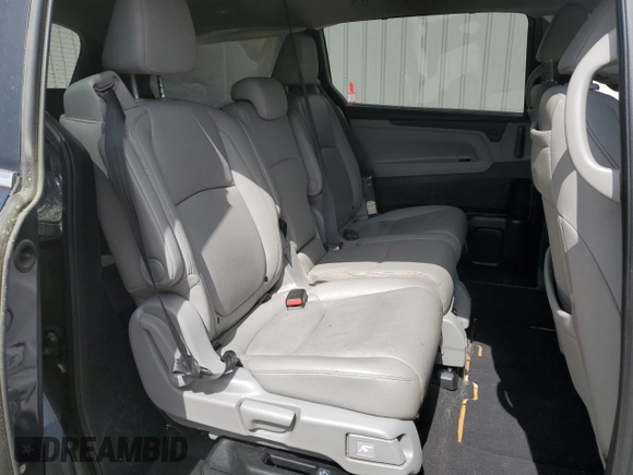 2021 Honda Odyssey Touring with VIN 5FNRL6H83MB028717, listed as a Copart auction lot 49236485 with 63,576 mi miles and Salvage Title. Bid and sale history available at carsss.com. Image 11.