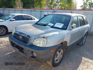2003 Hyundai Santa Fe GLS z VIN KM8SC13E93U541750, wystawiony jako IAAI lot #42200817 z przebiegiem 174 842 mil mil oraz . Historia ofert i sprzedaży dostępna na DreamBid. Obrazek 6.