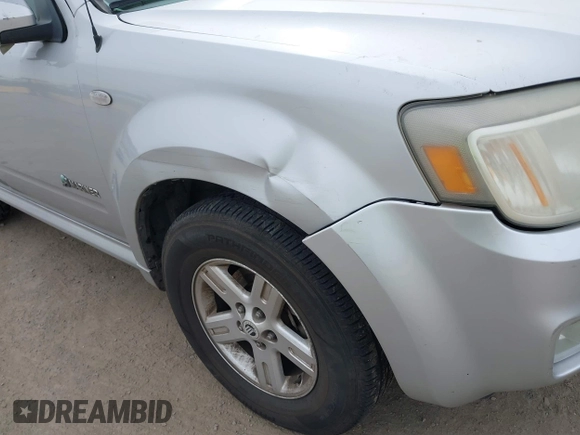 2008 Mercury Mariner with VIN 4M2CU39H58KJ39854, listed as a IAAI auction lot 41567810 with 267,329 mi miles and . Bid and sale history available at DreamBid. Image 6.