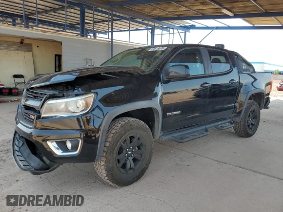2016 Chevrolet Colorado 4WD Z71 with VIN 1GCGTDE33G1201251, listed as a Copart auction lot 64518695 with 123,602 mi miles and Salvage title. Bid and sale history available at DreamBid. Image 1.