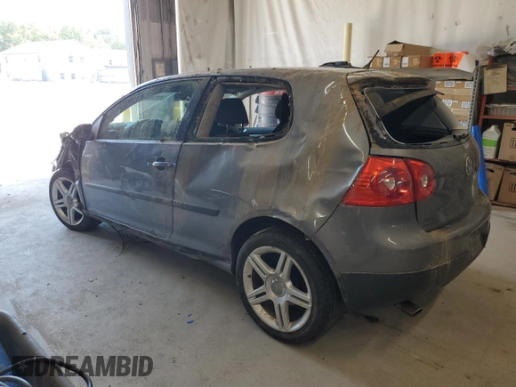 2009 Volkswagen Rabbit S with VIN WVWAB71K29W124868, listed as a Copart auction lot 62224655 with 142,262 mi miles and Salvage title. Bid and sale history available at DreamBid. Image 2.