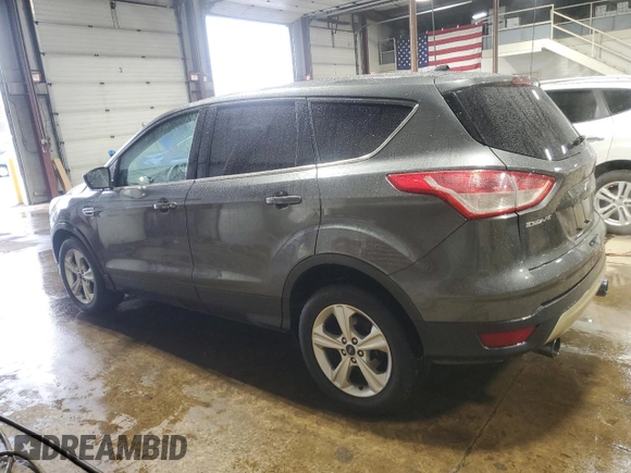2015 Ford Escape SE with VIN 1FMCU9GX3FUB23667, listed as a Copart auction lot 52184155 with 184,954 mi miles and Salvage Title. Bid and sale history available at carsss.com. Image 2.