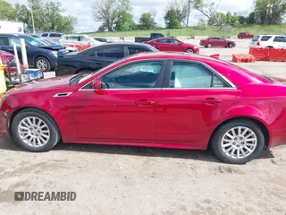 2011 Cadillac CTS with VIN 1G6DC5EY2B0143073, listed as a IAAI auction lot 42322497 with 133,992 mi miles and . Bid and sale history available at DreamBid. Image 14.