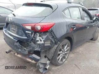 2018 Mazda 3 Touring with VIN 3MZBN1L34JM204883, listed as a IAAI auction lot 41094541 with 125,205 mi miles and . Bid and sale history available at DreamBid. Image 6.