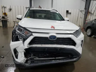 2019 Toyota RAV4 Hybrid XLE with VIN 2T3RWRFV1KW016526, listed as a Copart auction lot 61466435 with 64,255 mi miles and Salvage title. Bid and sale history available at DreamBid. Image 5.