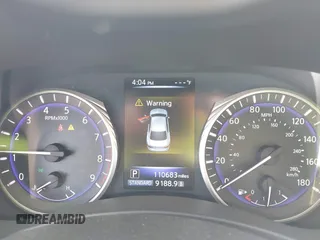 2015 Infiniti Q50 Premium with VIN JN1BV7AP8FM331055, listed as a IAAI auction lot 41828967 with 110,683 mi miles. Bid and sale history available at carsss.com. Image 7.