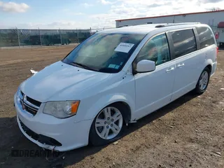2019 Dodge Grand Caravan SXT with VIN 2C4RDGCG4KR771745, listed as a IAAI auction lot 41859267 with 97,436 mi miles and . Bid and sale history available at DreamBid. Image 2.