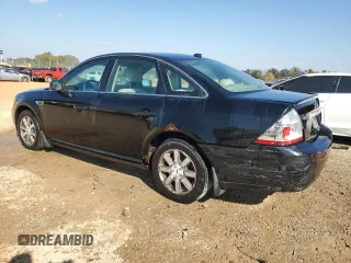 2008 Ford Taurus SEL with VIN 1FAHP24W68G164015, listed as a Copart auction lot 77752114 with 197,691 mi miles and Salvage Title. Bid and sale history available at carsss.com. Image 2.