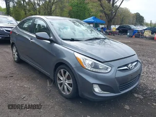 2014 Hyundai Accent GLS with VIN KMHCU4AE9EU761298, listed as a IAAI auction lot 42186032 with 118,848 mi miles. Bid and sale history available at carsss.com. Image 1.