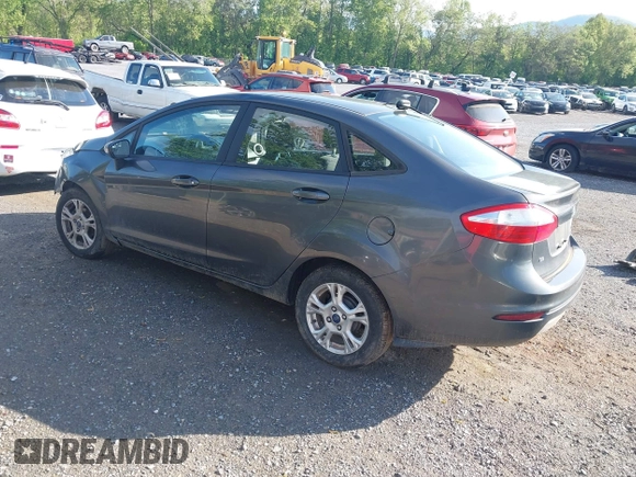 2016 Ford Fiesta SE z VIN 3FADP4BJ8GM184675, wystawiony jako IAAI lot #42169234 z przebiegiem 54 231 mil mil oraz . Historia ofert i sprzedaży dostępna na DreamBid. Obrazek 3.