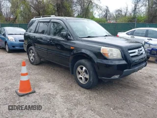 2008 Honda Pilot EX-L with VIN 5FNYF18528B046949, listed as a IAAI auction lot 42048639 with 206,710 mi miles. Bid and sale history available at carsss.com. Image 1.