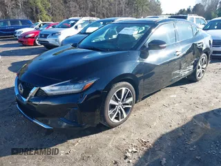 2019 Nissan Maxima Platinum z VIN 1N4AA6AV0KC379524, wystawiony jako IAAI lot #40862758 z przebiegiem 74 145 mil mil oraz . Historia ofert i sprzedaży dostępna na DreamBid. Obrazek 20.