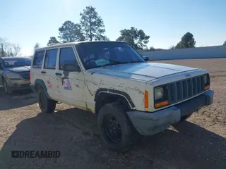 1998 Jeep Cherokee z VIN 1J4FB28S8WL129806, wystawiony jako IAAI lot #41586070 z przebiegiem 216 786 mil mil oraz . Historia ofert i sprzedaży dostępna na DreamBid. Obrazek 1.