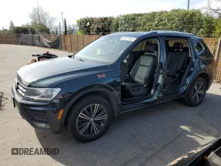 2018 Volkswagen Tiguan SEL with VIN 3VV3B7AX8JM051483, listed as a Copart auction lot 50076645 with 156,356 mi miles and Salvage Title. Bid and sale history available at DreamBid. Image 1.