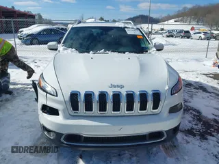 2015 Jeep Cherokee Limited with VIN 1C4PJMDS9FW718151, listed as a IAAI auction lot 41344018 with 124,185 mi miles and . Bid and sale history available at DreamBid. Image 12.