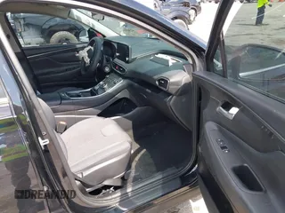 2021 Hyundai Santa Fe SE z VIN 5NMS14AJ0MH332918, wystawiony jako IAAI lot #42365534 z przebiegiem 58 720 mil mil oraz . Historia ofert i sprzedaży dostępna na DreamBid. Obrazek 5.