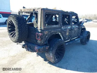 2022 Jeep Wrangler 4xe Unlimited Sahara with VIN 1C4JJXP66NW233812, listed as a IAAI auction lot 41325503 with 1 mi miles. Bid and sale history available at carsss.com. Image 4.