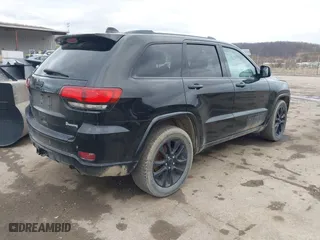 2018 Jeep Grand Cherokee Laredo E with VIN 1C4RJFAG3JC324434, listed as a IAAI auction lot 41812311 with 140,820 mi miles. Bid and sale history available at carsss.com. Image 4.