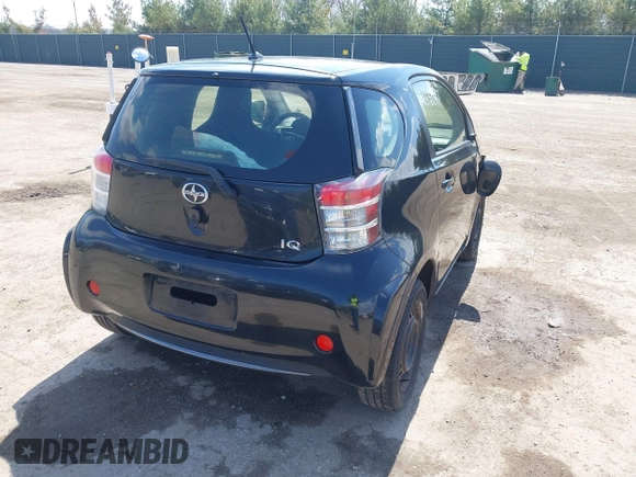 2012 Scion iQ with VIN JTNJJXB03CJ018302, listed as a IAAI auction lot 42000097 with 191,918 mi miles. Bid and sale history available at carsss.com. Image 4.
