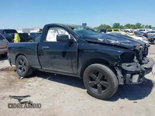 2015 Ram 1500 Tradesman z VIN 3C6JR6AT2FG563942, wystawiony jako IAAI lot #41984985 z przebiegiem 111 814 mil mil oraz . Historia ofert i sprzedaży dostępna na DreamBid. Obrazek 1.