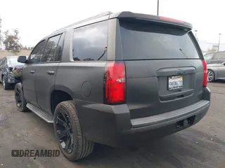 2018 Chevrolet Tahoe LT with VIN 1GNSCBKC5JR126474, listed as a IAAI auction lot 41896310 with 90,928 mi miles and . Bid and sale history available at DreamBid. Image 3.