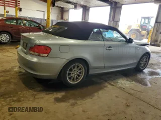 2011 BMW 1 Series 128i with VIN WBAUL7C57BVM80274, listed as a Copart auction lot 52127595 with 104,952 mi miles and Salvage title. Bid and sale history available at DreamBid. Image 3.