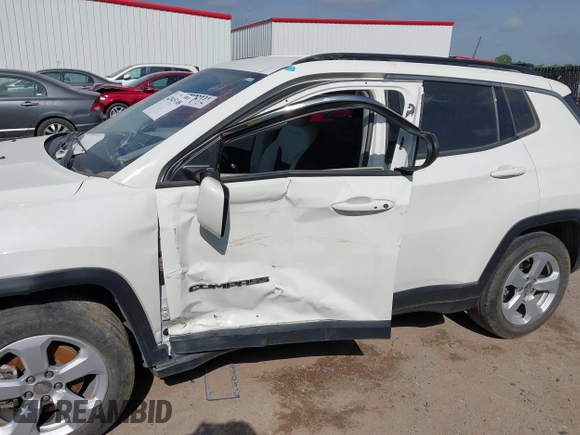 2021 Jeep Compass Latitude with VIN 3C4NJCBBXMT563942, listed as a IAAI auction lot 42045108 with 166,153 mi miles and . Bid and sale history available at DreamBid. Image 6.