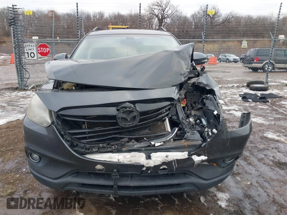 2015 Mazda CX-9 Grand Touring with VIN JM3TB2DAXF0447537, listed as a IAAI auction lot 41191694 with 157,113 mi miles. Bid and sale history available at carsss.com. Image 12.