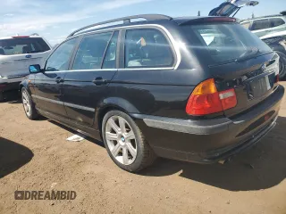 2003 BMW 3 Series 325i with VIN WBAEN33483PC12700, listed as a Copart auction lot 67770984 with 171,840 mi miles and Salvage Title. Bid and sale history available at carsss.com. Image 2.