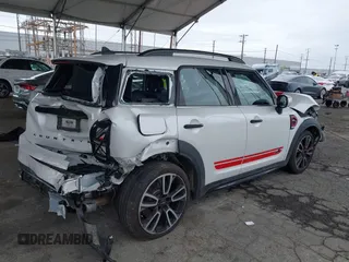 2024 MINI Countryman John Cooper Works with VIN WMZ33BS03R3R53245, listed as a IAAI auction lot 41759752 with 22,574 mi miles and . Bid and sale history available at DreamBid. Image 4.