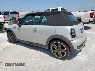 2013 MINI Convertible S с VIN WMWZP3C57DT705259, выставлен на аукционе Copart как лот 59954795 с пробегом 132 988 миль миль и Списание • Salvage title. История ставок и продаж доступна на DreamBid. Изображение 2.
