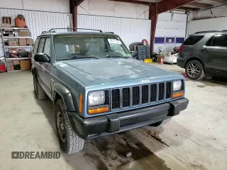 1997 Jeep Cherokee Sport with VIN 1J4FJ68S4VL532609, listed as a Copart auction lot 46711285 with 273,930 mi miles and Salvage Title. Bid and sale history available at carsss.com. Image 12.