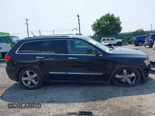 2011 Jeep Grand Cherokee Overland with VIN 1J4RR6GT3BC574037, listed as a IAAI auction lot 42411532 with 158,765 mi miles and . Bid and sale history available at DreamBid. Image 14.