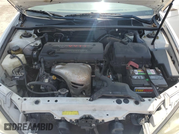 2005 Toyota Camry STD z VIN 4T1BE32K45U024498, wystawiony jako Copart lot #57498975 z przebiegiem 212 549 mil mil oraz Szkoda całkowita • Salvage title. Historia ofert i sprzedaży dostępna na DreamBid. Obrazek 11.