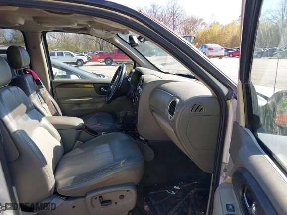 2003 GMC Envoy XL SLT with VIN 1GKET16S136145209, listed as a IAAI auction lot 40862083 with 244,923 mi miles. Bid and sale history available at carsss.com. Image 5.