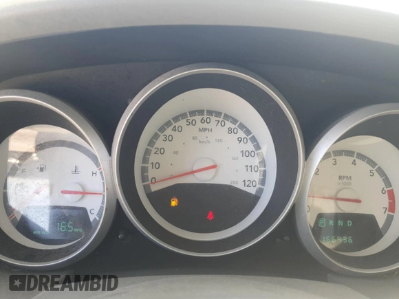 2010 Dodge Grand Caravan Hero with VIN 2D4RN3D11AR462932, listed as a Copart auction lot 50396755 with 166,936 mi miles and Salvage Title. Bid and sale history available at DreamBid. Image 9.